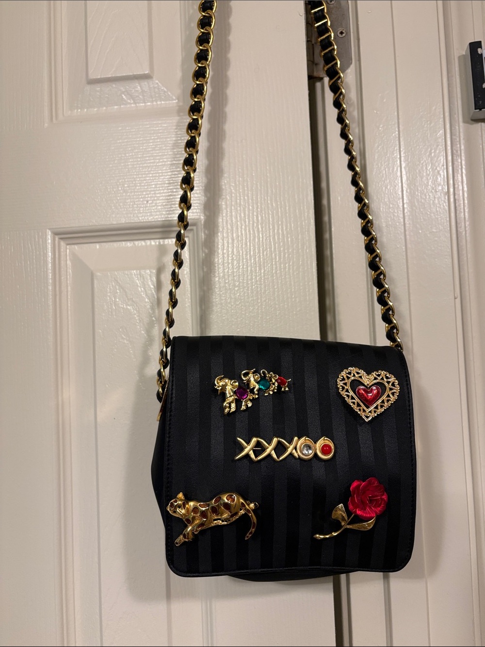 Vintage black crossbody bag with brooches